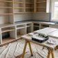 kitchen cabinet doors on trestles being painted white adelaide 85x85